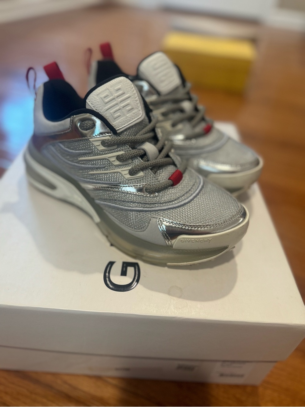Givenchy Silver Metallic Mesh Sneakers with Red Tabs